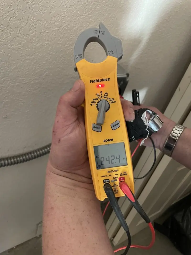 Voltage testing with clamp meter during Electrical Installation Services in Burien